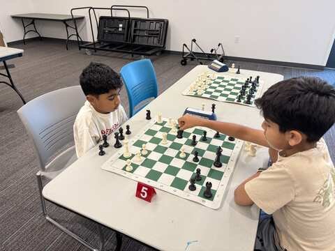 Players at the Fulshear Library community chess tournament